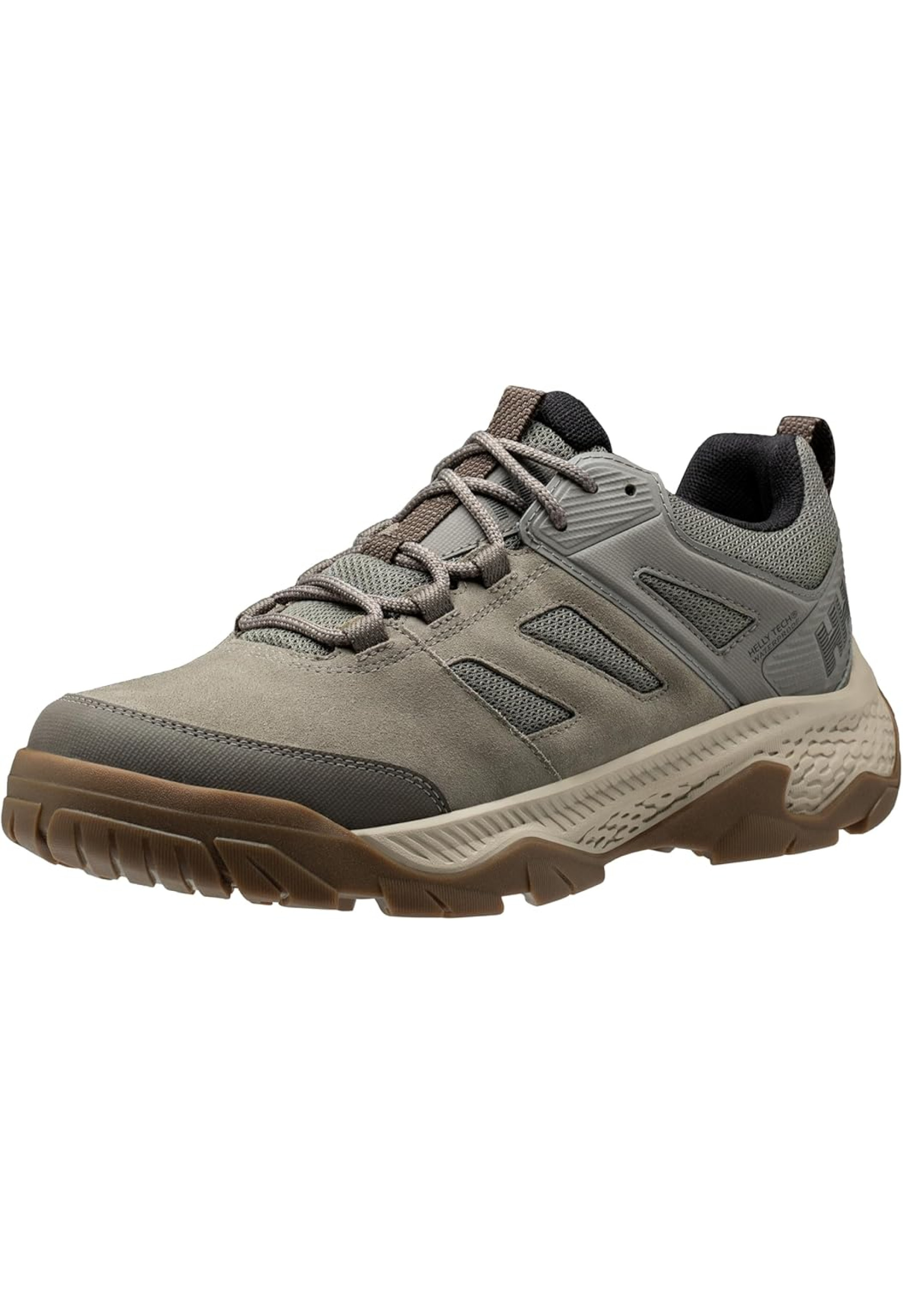 Образ с кроссовками Helly Hansen Switchback Low 3 HT Fallen Rock на мокрой горной тропе 2026