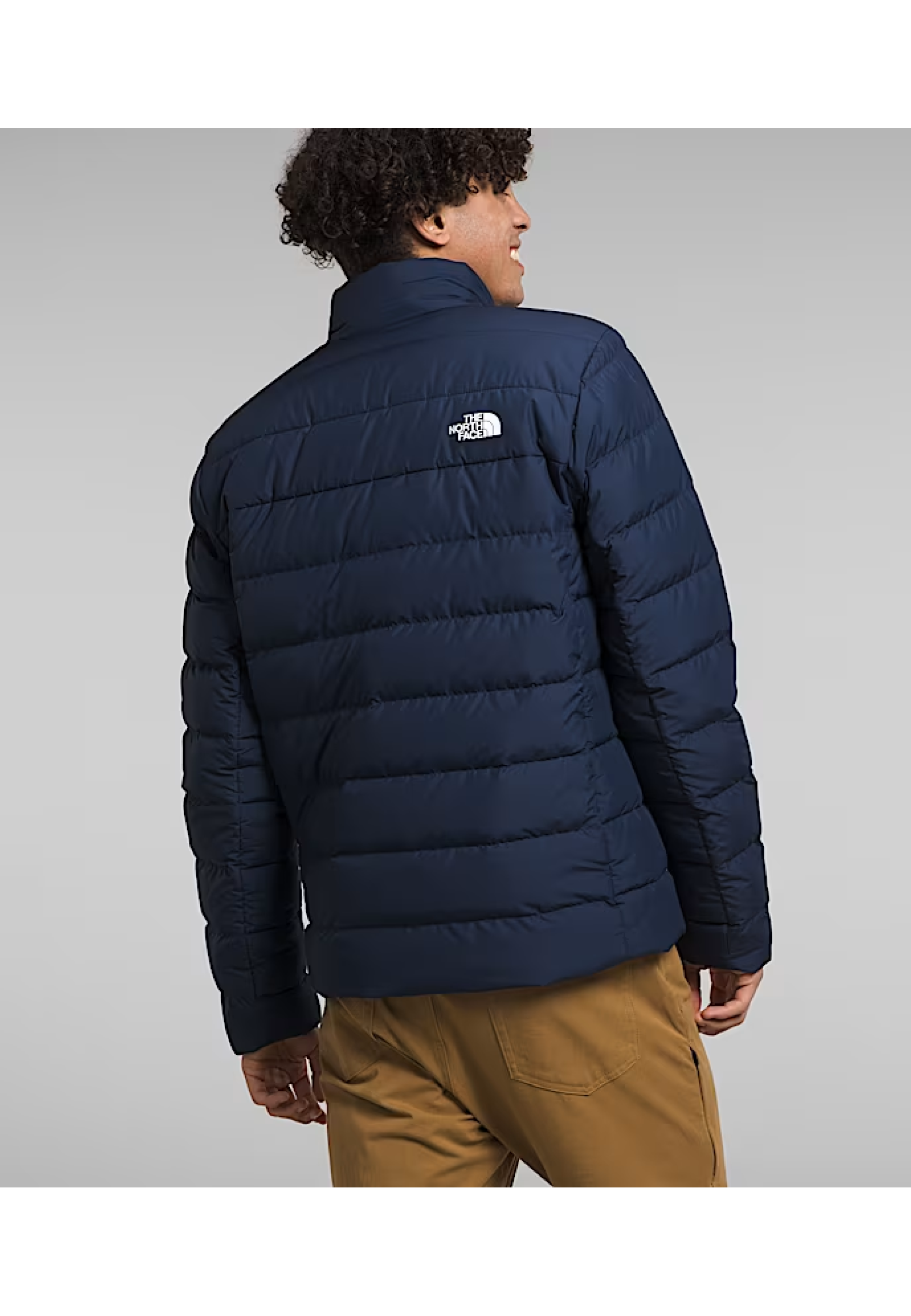 Чоловіча куртка The North Face Aconcagua III Summit Navy у міському зимовому образі