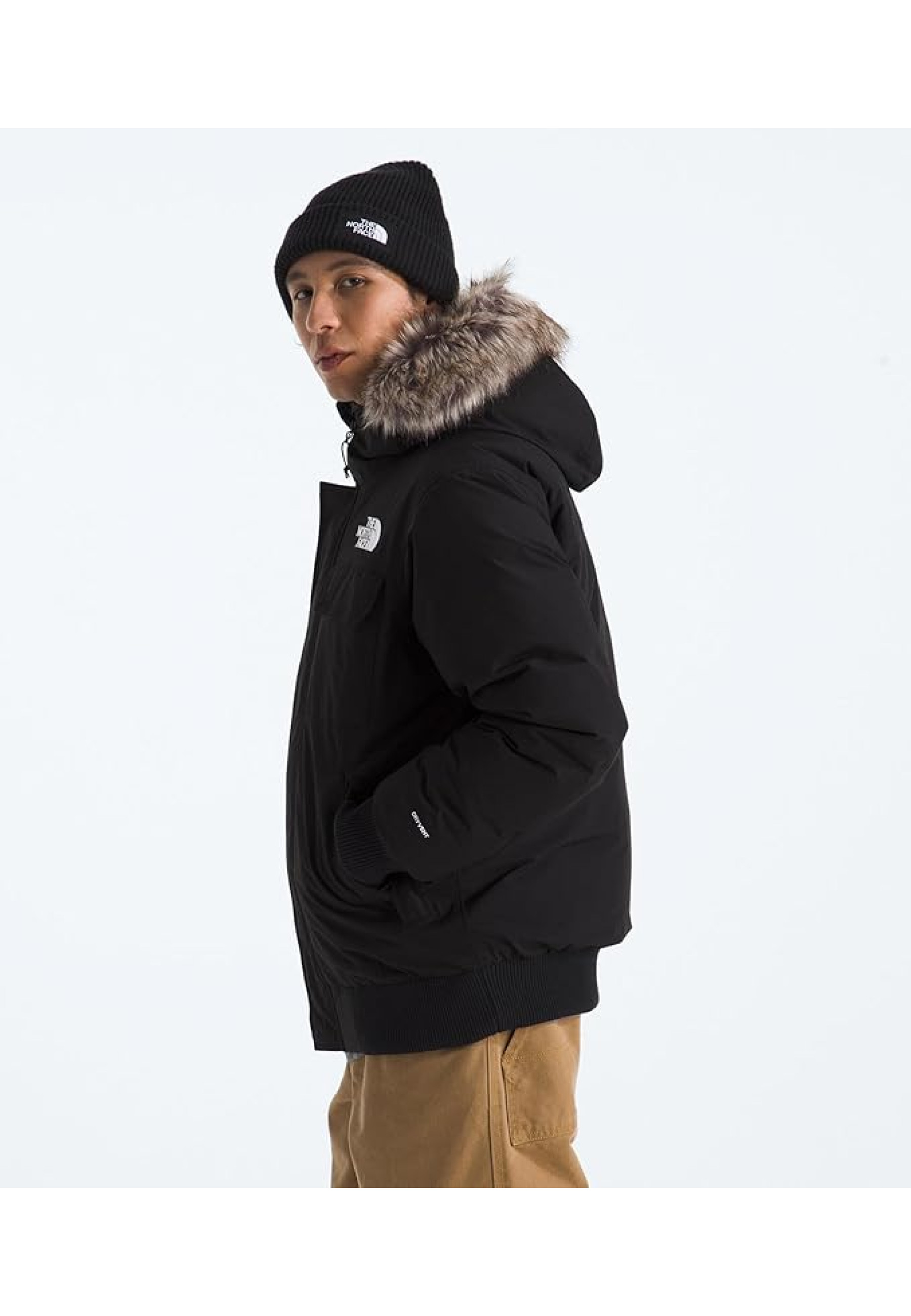 Outfit with North Face McMurdo Bomber Jacket Tnf Black and jeans for winter 2026 style