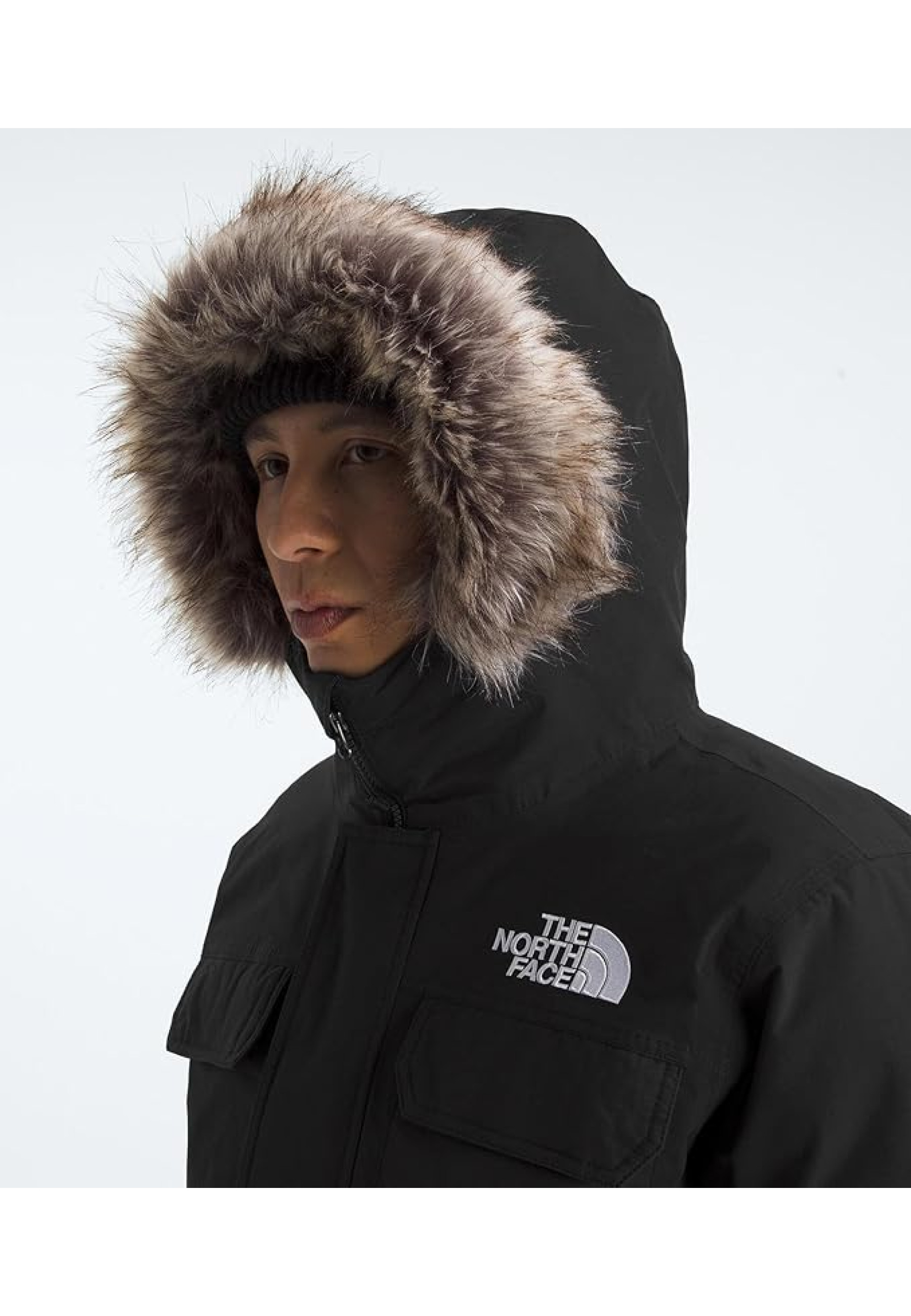 Outfit with North Face McMurdo Bomber Jacket Tnf Black and jeans for winter 2026 style