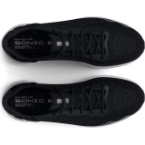 Runner wearing Under Armour HOVR Sonic 6 Black/White shoes on morning run 2026