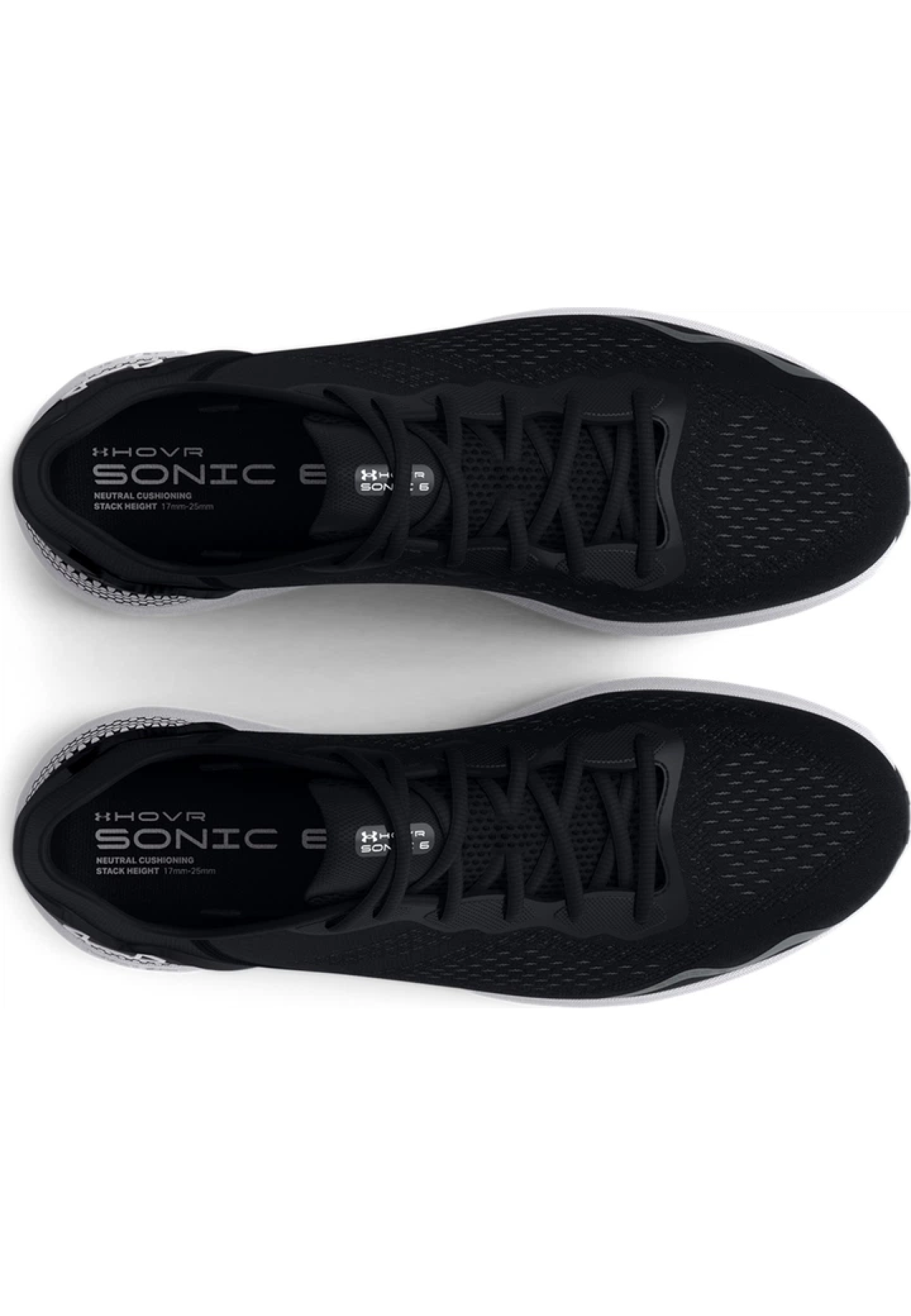 Runner wearing Under Armour HOVR Sonic 6 Black/White shoes on morning run 2026