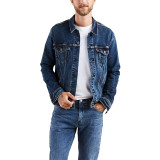 Man wearing Levi's Trucker Jacket Colusa Medium Wash with jeans and sneakers