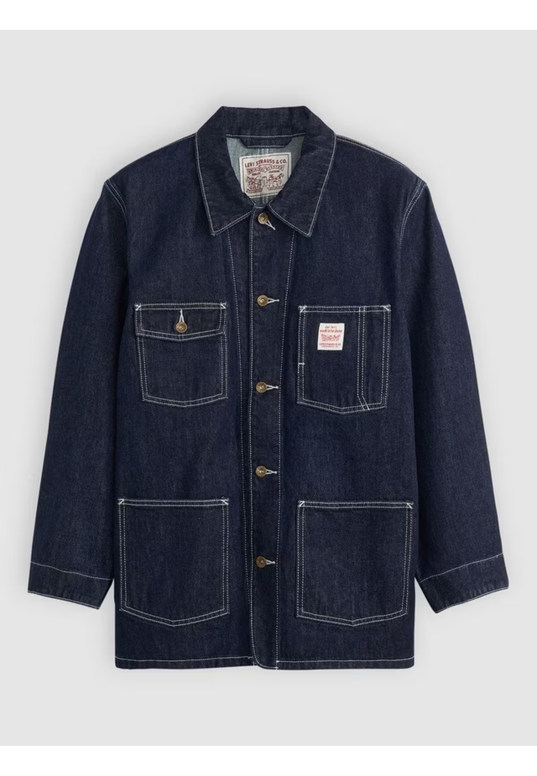 Man wearing Levi's Berkley Chore Coat Dark Wash with jeans and boots