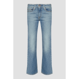 Жіночі джинси Levi's Superlow Bootcut Medium Wash у повсякденному образі з чоботами
