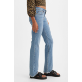 Жіночі джинси Levi's Superlow Bootcut Medium Wash у повсякденному образі з чоботами
